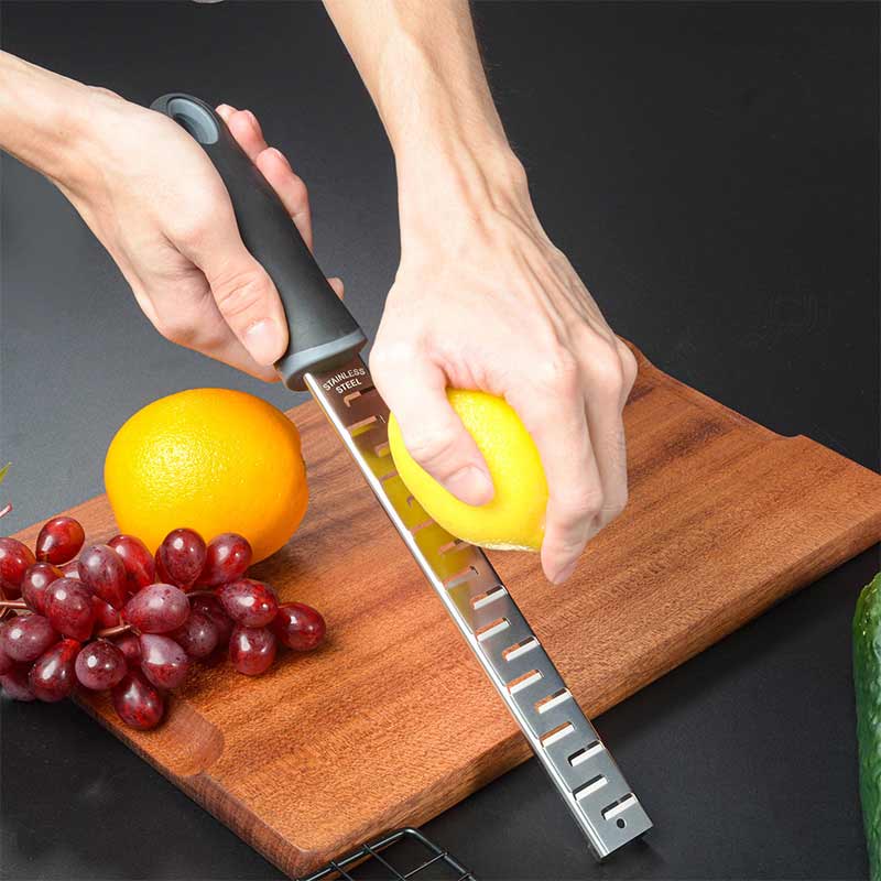 Manual lemon peel grater